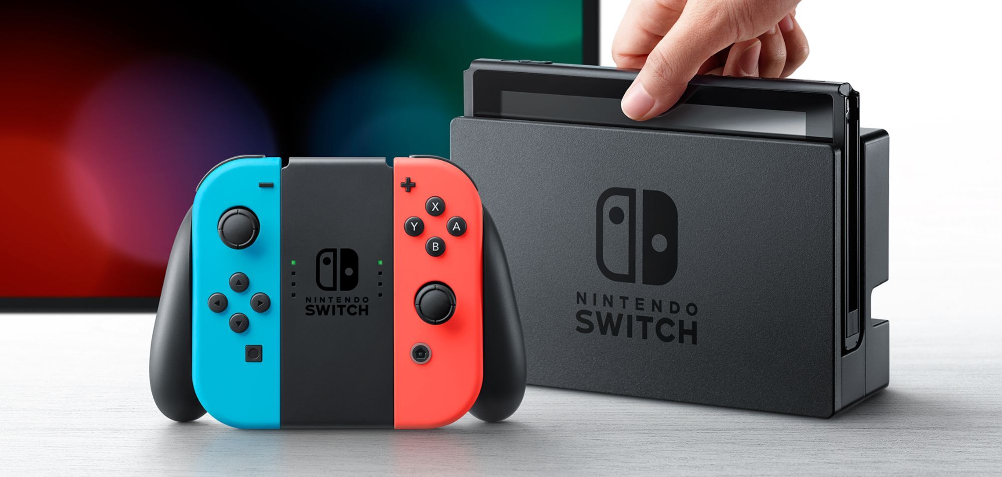 Nintendo Switch avec JoyCon rouge fluorescent et bleu néon Rakuten