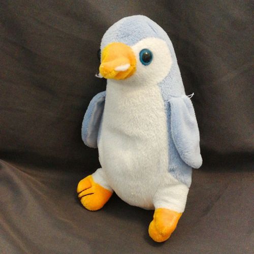 peluche pingouin bleu