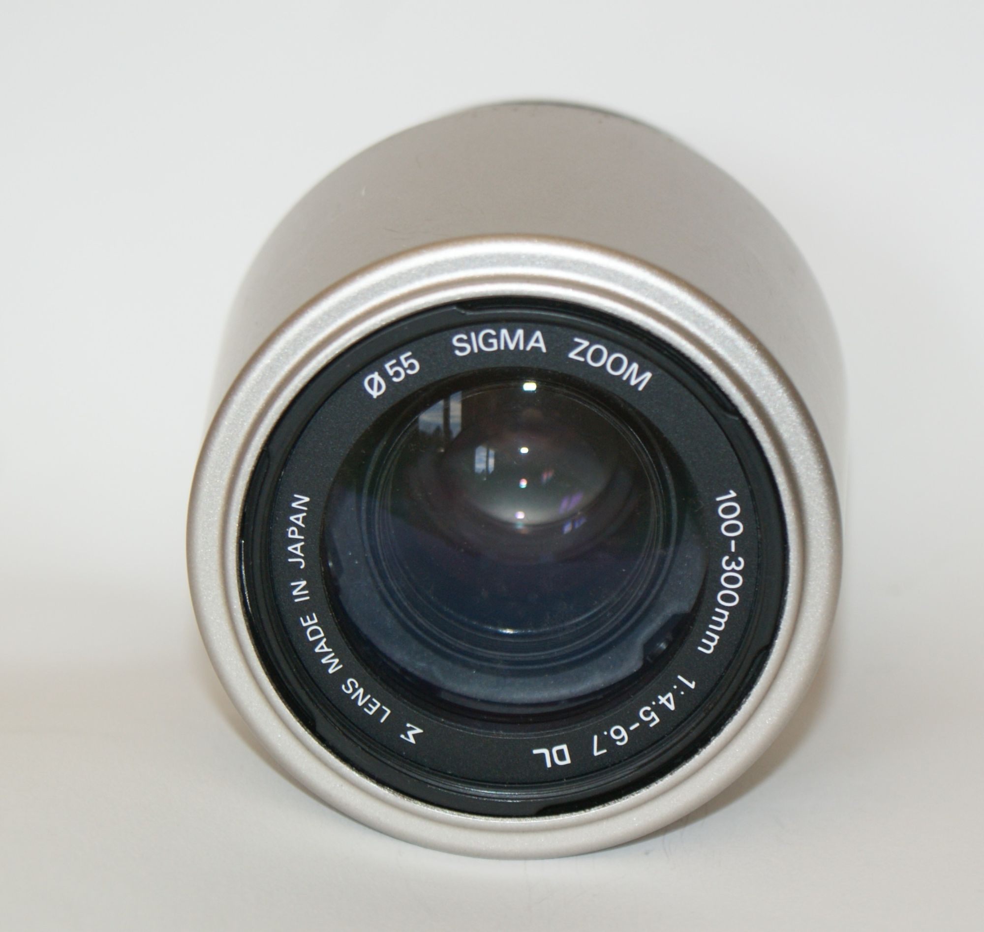 Zoom sigma 100 d'occasion  