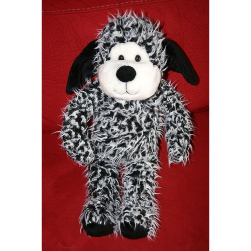 peluche chien noir et blanc